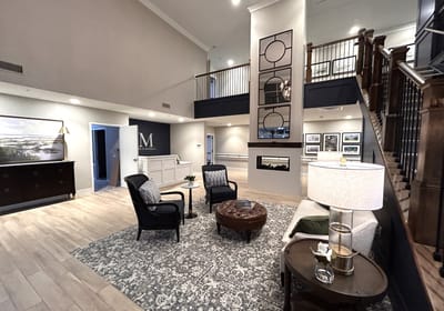 Bright lobby area with seating and artwork