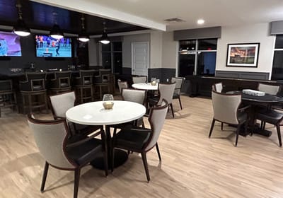 Interior dining area with tables and chairs