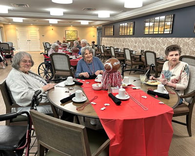 Residents enjoying a snack in the dining room