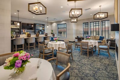 Dining area with tables and lounge seating