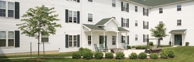Exterior view of Silver Spring Gardens with outdoor seating