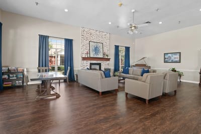 Bright common area with seating and games