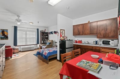 Interior view of a resident room with kitchen area