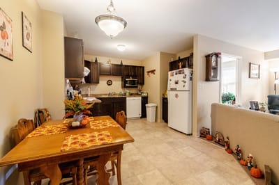 Cozy kitchen space with wooden dining table