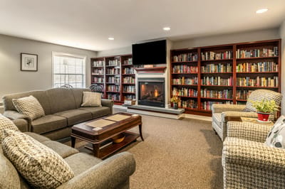 Cozy common area with bookshelves and seating