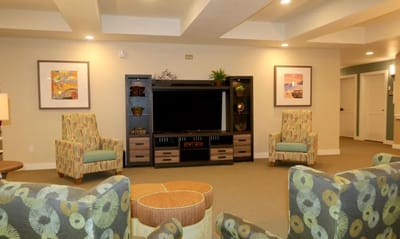 Bright common area with seating and decor