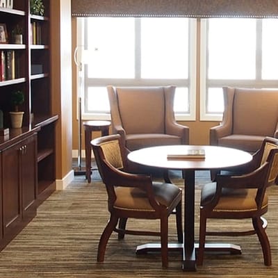 Common area with seating and bookshelves