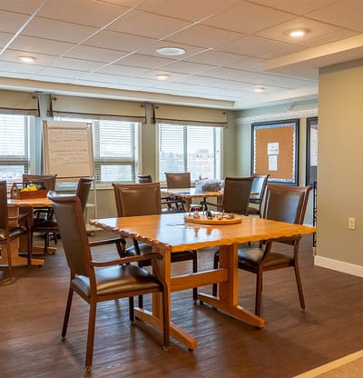 Interior common area with a wooden table and chairs