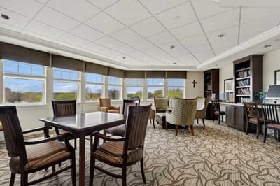 Bright common area with seating and windows