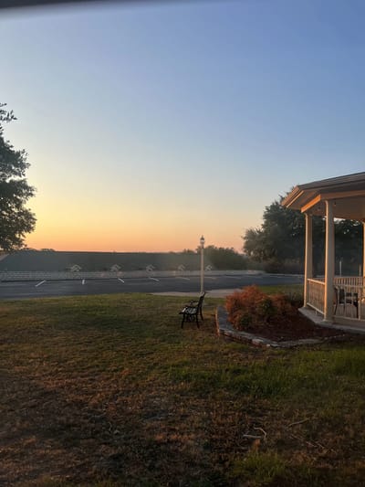 View of the facility's porch at sunset