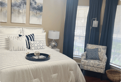 A well-decorated private bedroom with soft lighting
