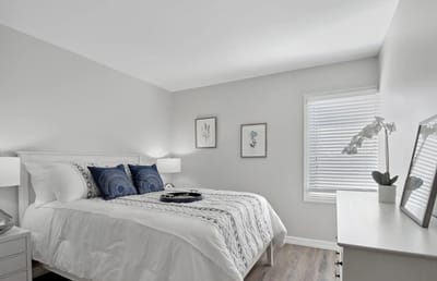 Cozy bedroom with bright bedding and decor