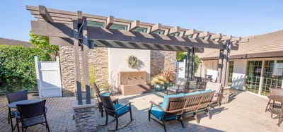 Outdoor patio with seating and pergola