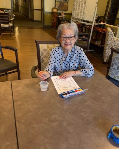 Resident engaged in an arts and crafts activity
