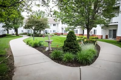 A landscaped outdoor path in a senior living community