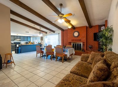 Interior common space with dining table and sofa