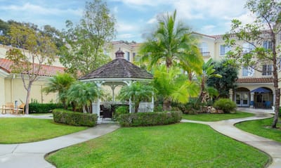 Beautiful outdoor garden with gazebo and manicured paths