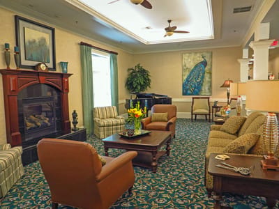 Cozy common area with seating and piano
