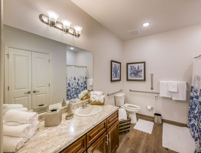 Brightly lit bathroom with modern fixtures