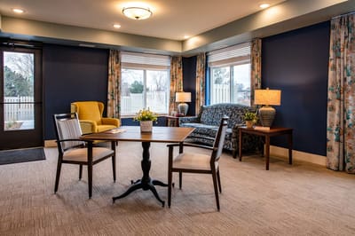 Comfortable common area with seating and natural light