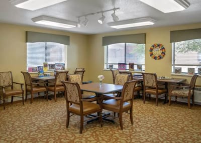 Bright common area with tables and chairs