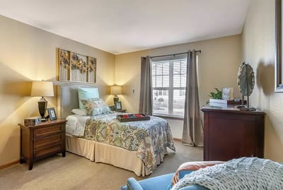 Cozy private room with bed and decor