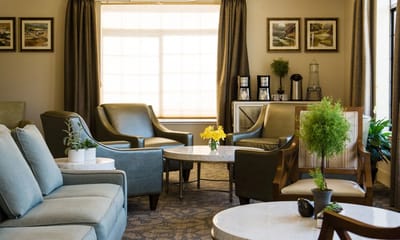 Interior lounge area with seating and natural light