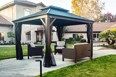 Outdoor gazebo seating area with a view of the facility