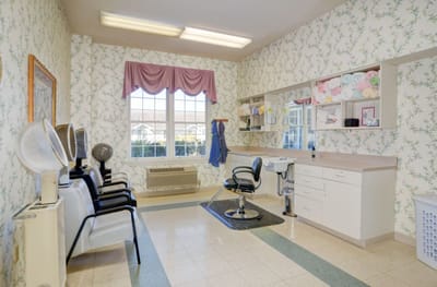 Beauty salon interior with styling chairs and mirrors