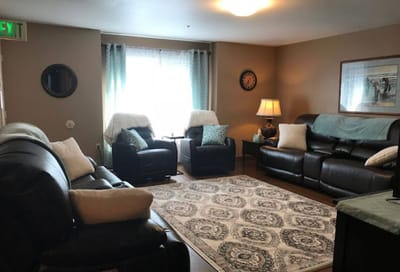 Cozy common area with seating and natural light