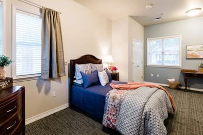 Cozy resident bedroom with warm lighting