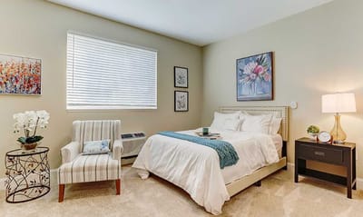 Cozy private bedroom with light colors and modern decor