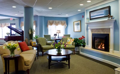 Bright common area with a fireplace and seating