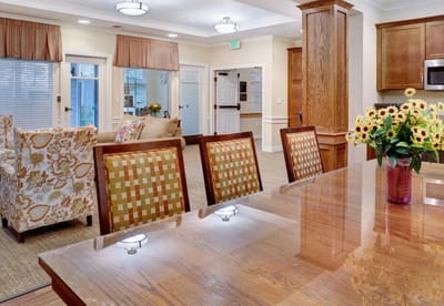 An inviting common area with comfortable seating and flowers
