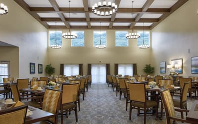 Bright dining room with tables and chairs