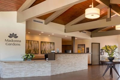 Bright and welcoming interior of Madonna Gardens lobby