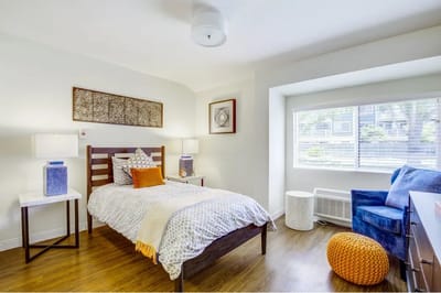 Cozy interior room with bed and seating area