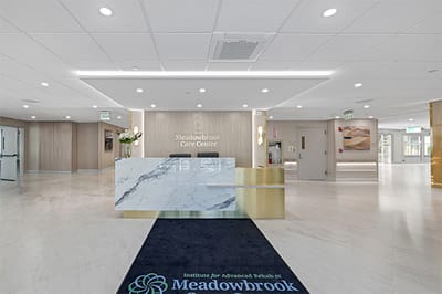 Bright lobby with reception desk and decor