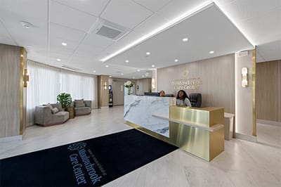 Reception area at Meadowbrook Care Center with staff members