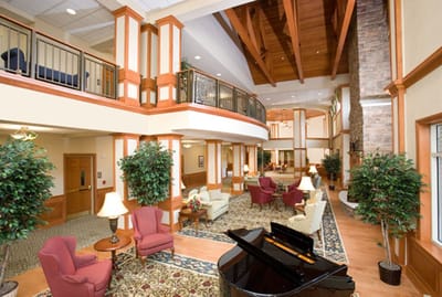 Interior view of a common area with seating and plants