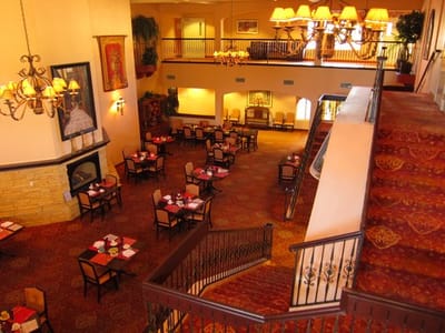 Interior view of a dining area with tables and chairs