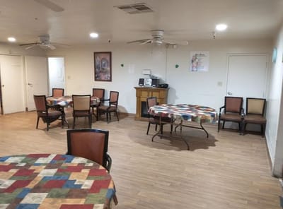 Bright common area with tables and chairs