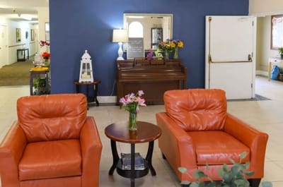 Interior view of a cozy common area with seating