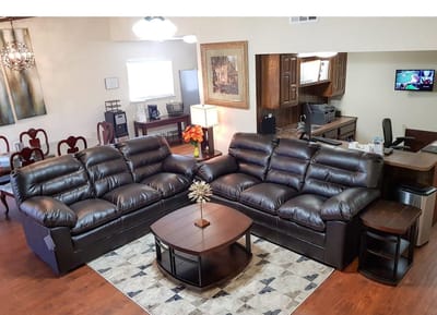 Cozy common area with comfortable leather sofas