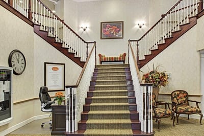 Interior lobby with staircase and seating area