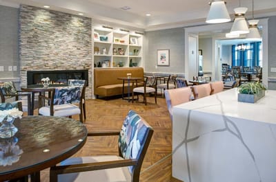 Bright interior common area with seating and decor