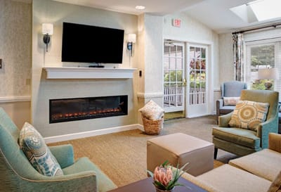 Cozy common area with comfortable seating and fireplace