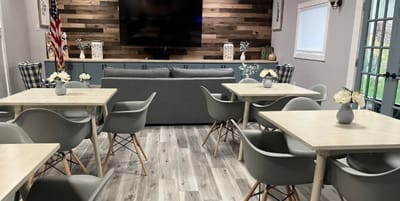 Cozy common area with seating and a TV