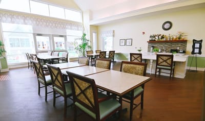 Bright dining area with tables and chairs