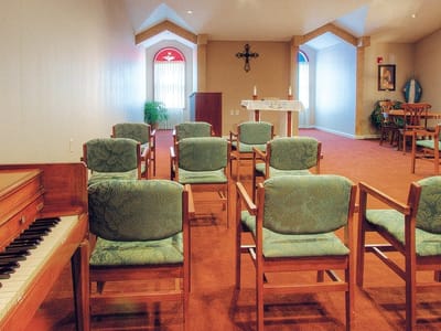 Bright interior of a multi-purpose room with chairs